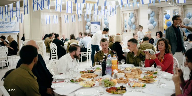 People gathered for a Rosh Hashanah meal