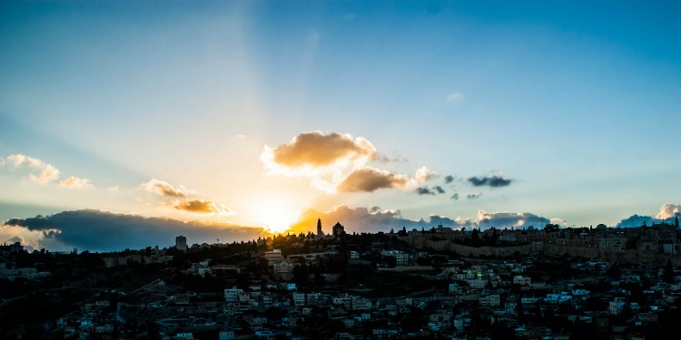 Sunrise over a large city.