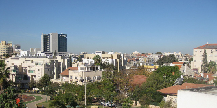 Aerial view of a community against blue sky.