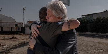 Bishop Lanier in Israel hugging an IDF soldier.