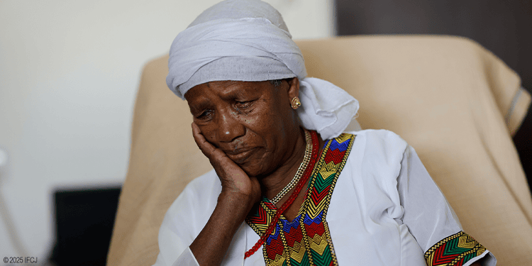 Sad elderly woman