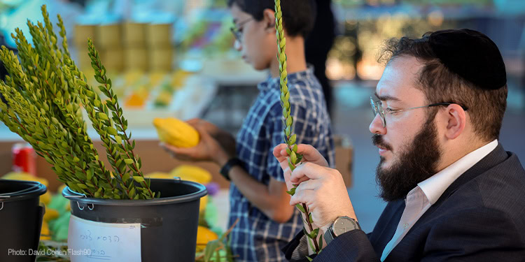 Volunteers planting flowers and participating in community outreach at a charitable event, demonstrating compassion and support for those in need.