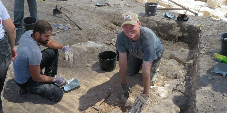 Two men on an archaeology dig.