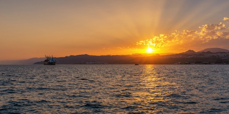 Leviticus 6:11–12, scene of the Red Sea at sunrise