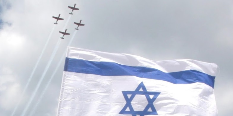 Planes fly over Israel's flag during Yom Haatzmaut