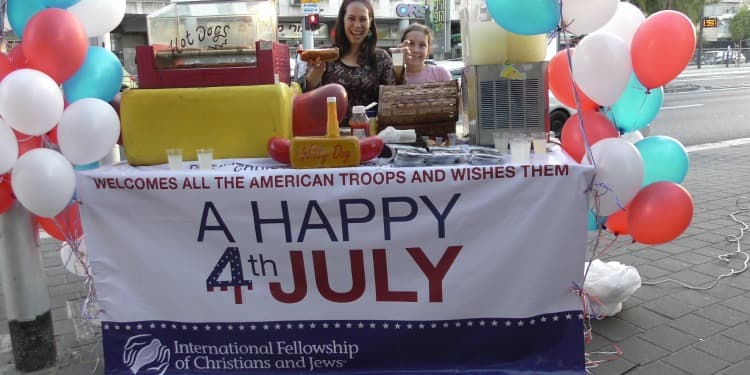 Yael Eckstein working a hot dog stand to honor U.S. soldiers on July 4th.