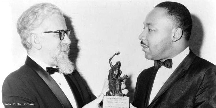 Rabbi Abraham Heschel, three-quarter length portrait, presenting Judaism and World Peace award to Dr. Martin Luther King