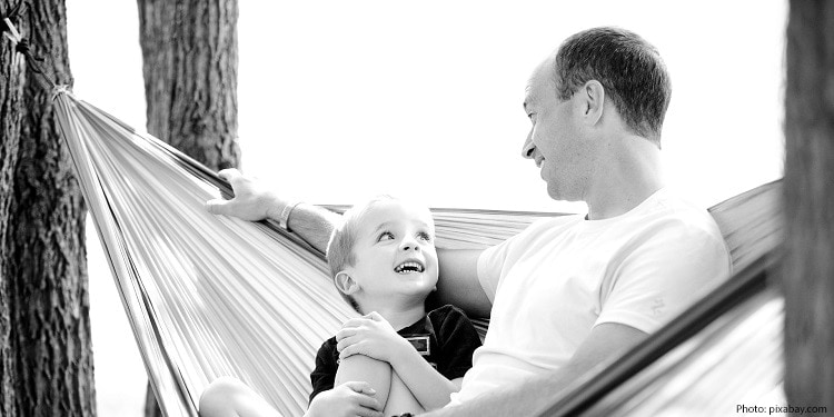 Father and son in a hammock
