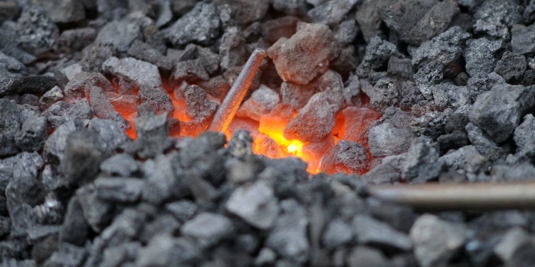Close up image of a flickering fire in coal.