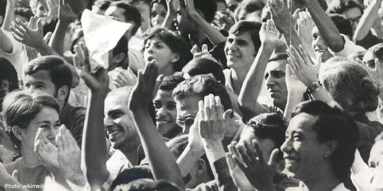 A large crowd cheering