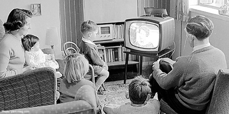 A family watching television in the 1950S