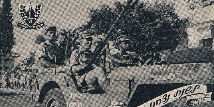 Major General of the IDF Albert Mandler riding in an army car