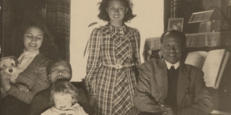 Tole Madna (right) and his housekeeper Mima Saina (holding young Alfred Munzer)