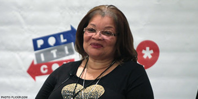 Alveda King in a black top looking out into the distance.