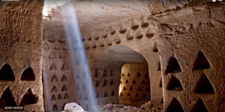 Older structure with triangles cut into the wall.
