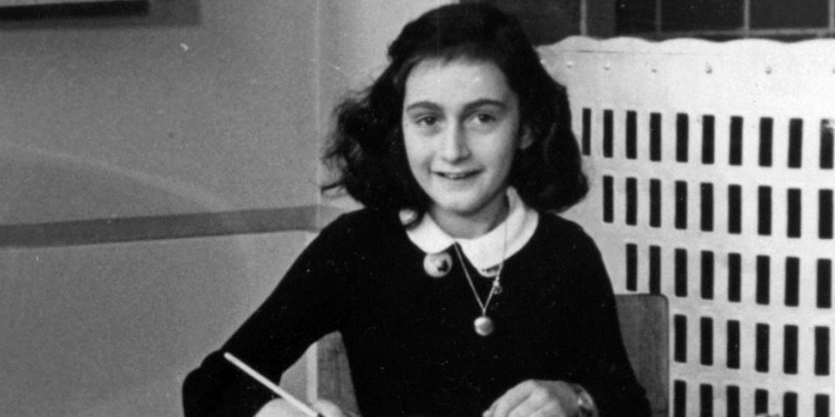 Black and white image of Anne Frank.
