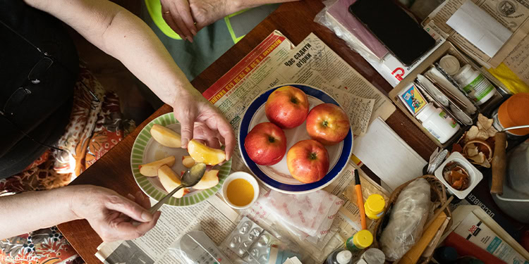 Apples and honey on a table
