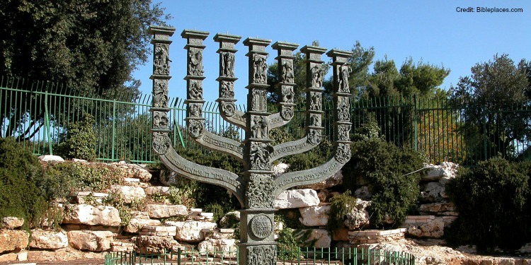 The large, bronze Knesset Menorah located at the edge of Gan Havradim