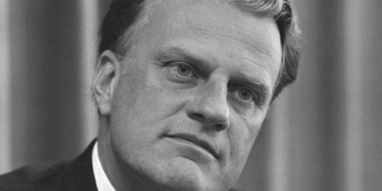 Headshot of Billy Graham looking off into the distance.