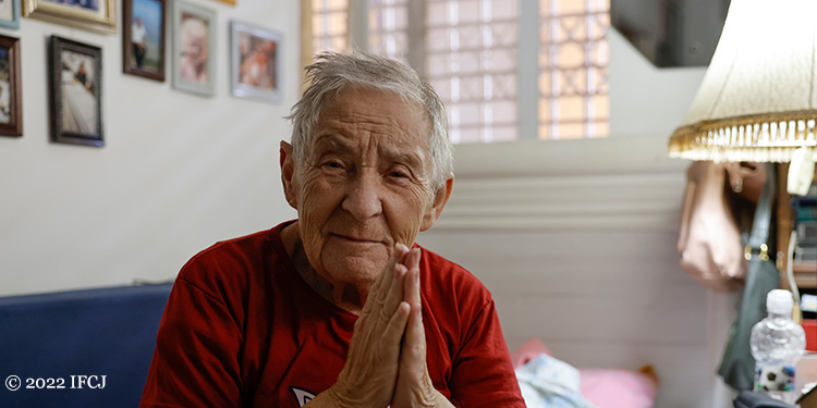 Elderly man being grateful