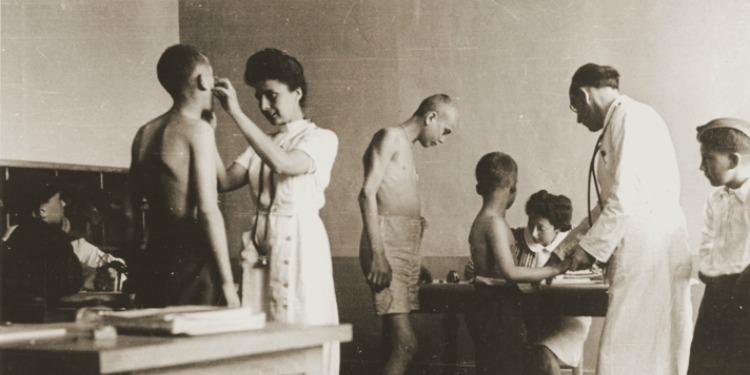 Liberated children of Buchenwald being treated