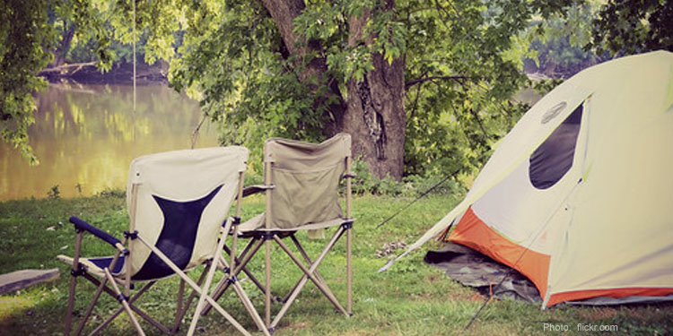 Tent and chairs in the woods