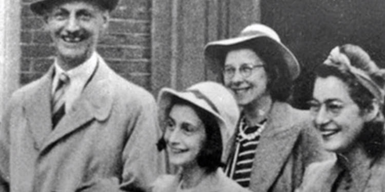 Black and white photo of Anne Frank and family.