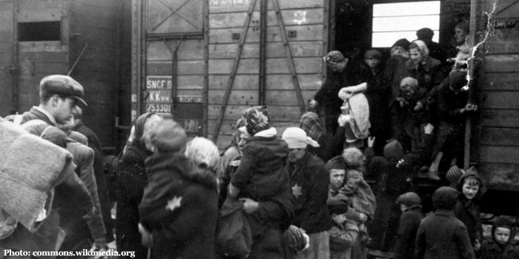 Jews being unloaded from a cattle car at Auschwitz-Birkenau, May 1944 during the Holocaust