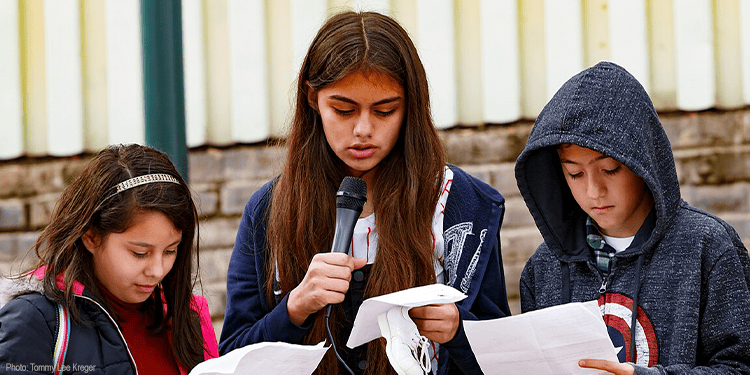 Children reading a poem on MLK day