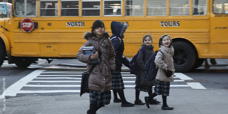 Children walking to the school bus