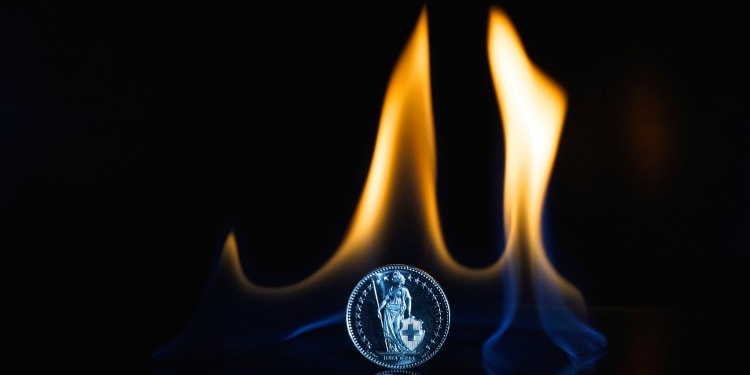 Flame of fire around a coin.