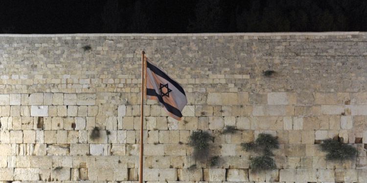 Israeli flag at Western Wall illustrates peace hoped for with Abraham Accord