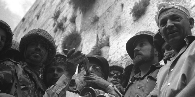 Rabbi Shlomo Goren blows shofar at Western Wall in Jerusalem, 1967