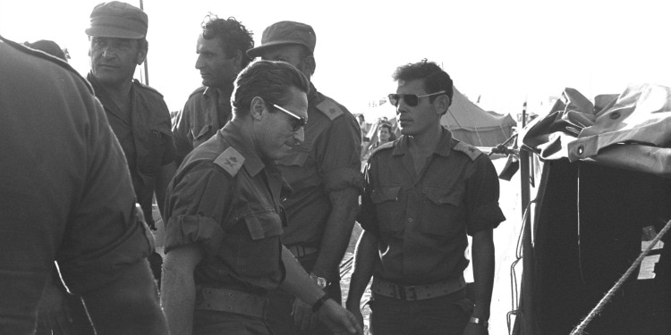 General Aharon Yariv enters tent to sign ceasefire during Yom Kippur War, November 11, 1973
