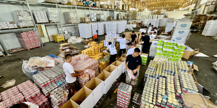 Food warehouse and packing food boxes for communities in the north of Israel in case of terrorist attack.