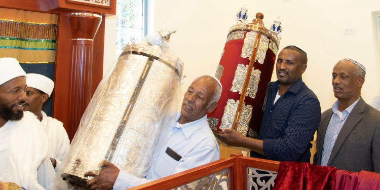 Five Ethiopian men in the Fellowship House Ethiopian Spiritual Center.