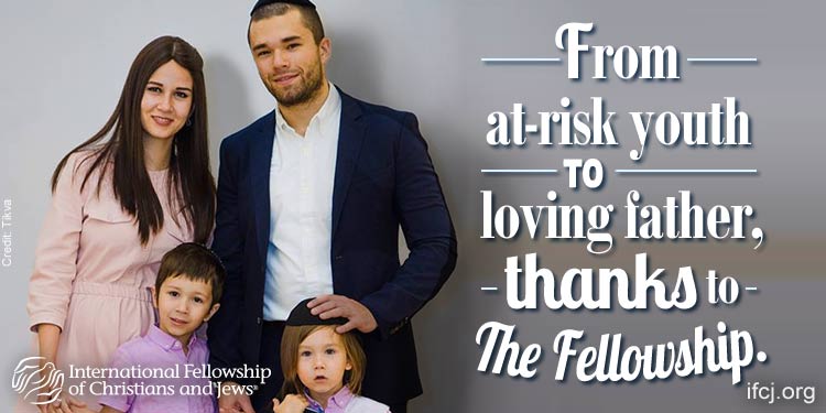 An IFCJ promotional ad featuring a family of four with the text: from at-risk youth to loving father beside them.