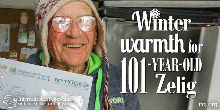 Zelig, IFCJ recipient smiling for a promotional with the text: Winter warmth for 101-year-old Zelig beside him.