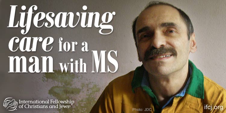 Oleg, IFCJ recipient with blue, orange, and green top on in an IFCJ promotion with the text: lifesaving care for a man with MS.