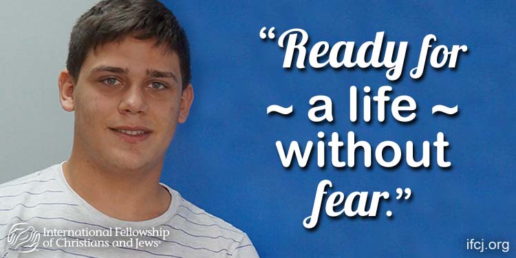 Gabriel, IFCJ recipient featured in an IFCJ promotion that reads: Ready for a life without fear.