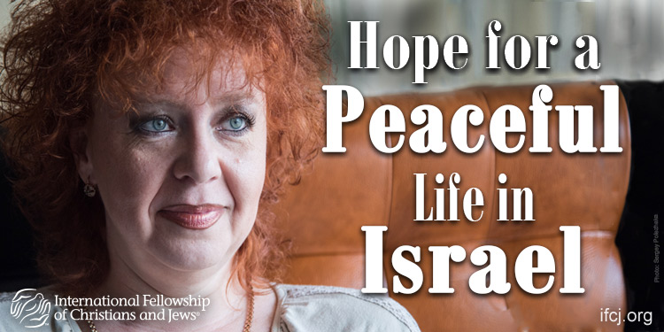 Tatyana, a middle-aged woman soft smiling featured in an IFCJ promotion with the text Hope for a Peaceful Life in Israel.
