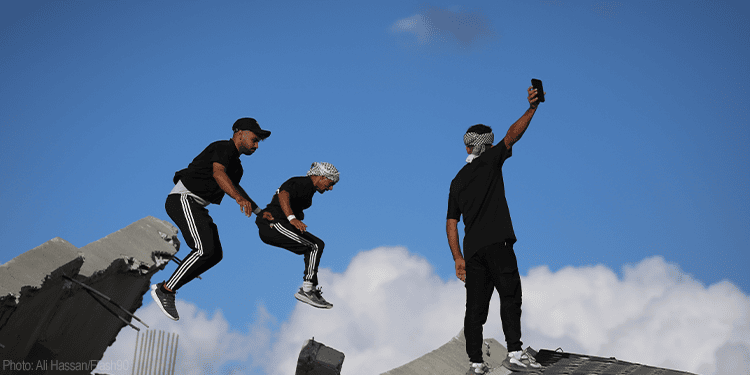 Three children jumping from a ledge with a clear blue sky background, symbolizing hope, resilience, and faith in difficult moments.