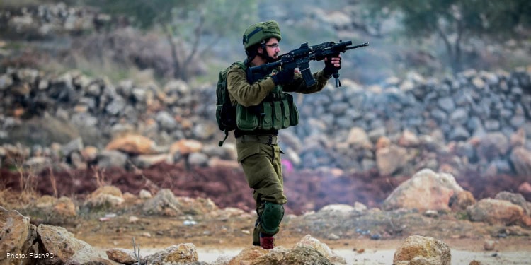 Palestinian protesters clash with Israeli security forces in Al-Mughayyir village near the West Bank city of Ramallah on January 3, 2020.