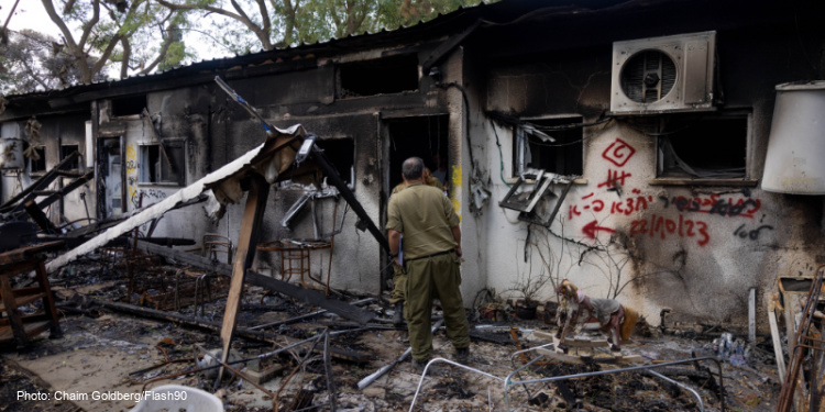 Israeli soldiers, destruction caused by Hamas terrorists, Kibbutz Nir Oz, October 7, 2023