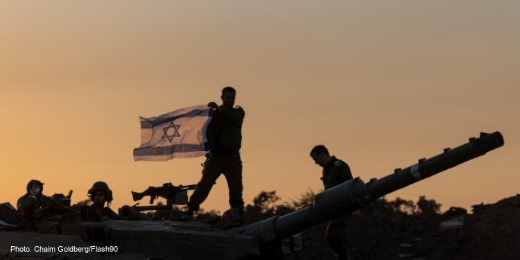 Israeli soldiers, Israel-Gaza border, southern Israel, Israeli flag