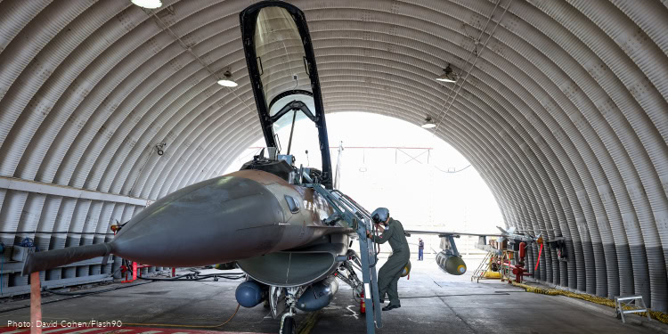 An Israeli Weapon systems officer going down from an F-16 Fighting Falcon in Ramat David Airbase, northern Israel, January 14, 2024.