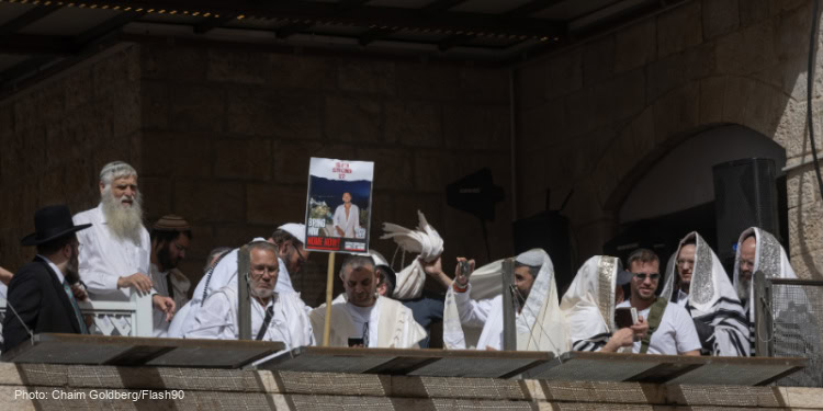 Jewish worshippers attend the Cohen Benediction priestly blessing at the Western Wall.