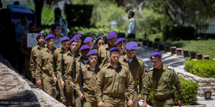 Family and friends of Israeli soldier Sergeant Almog Shalom attend his funeral.