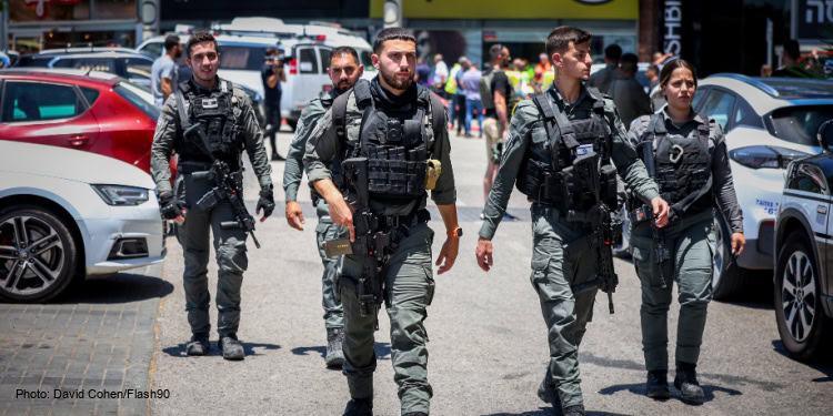 Police and rescue forces outside the scene of a stabbing attack in Karmiel, northern Israel, July 3, 2024