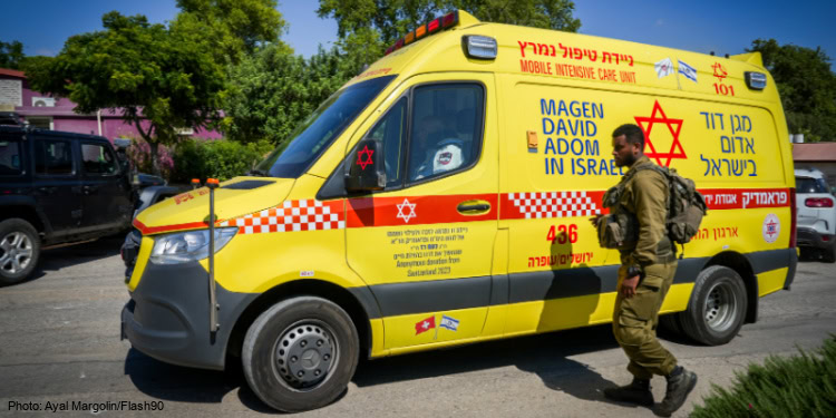 Israeli security and rescue forces at the scene where a man was killed from a missile fired from Lebanon in kibbutz HaGoshrim, July 30, 2024.